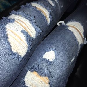 Dark blue ripped jeans